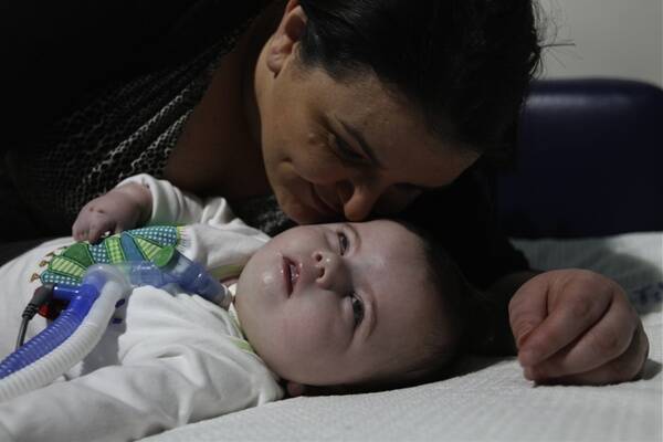 Dedicated: Sonia Gomes with her  son Dominic,  who suffers from two rare congenital conditions. Picture: NICK MOIR 