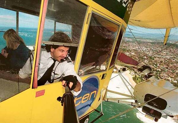Mike Nerandzic flying over Wollongong in 1996 in the Whitman's Airship.