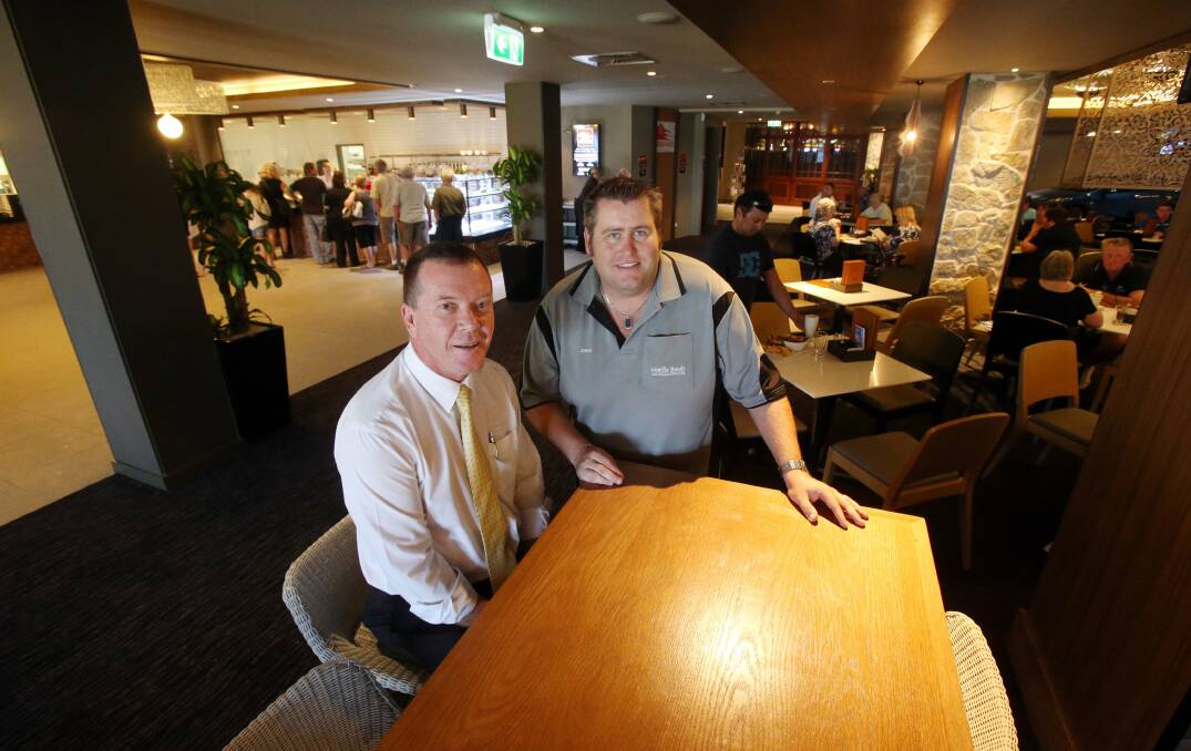 Warilla Bowling Club general manager Phillip Kipp (left) and the club's champion bowler, Jeremy Henry.