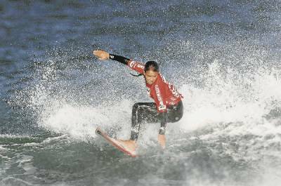 The unstoppable Sally Fitzgibbons catches a wave on her way to yet another win at the Roxy Surf Festival at Phillip Island in January.