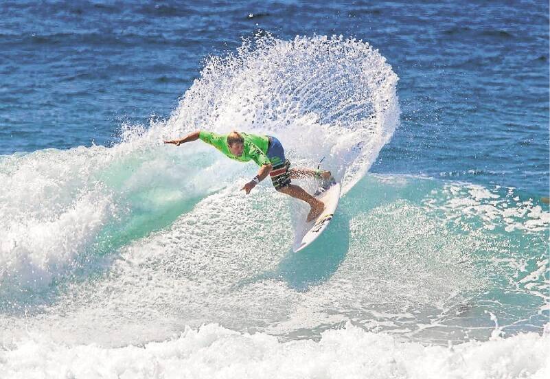 Rip it up: Nick Squires on his way to blasting up a crucial points buffer for Scarborough Boardriders in the Surftag qualifiers. Picture: WES LONERGAN