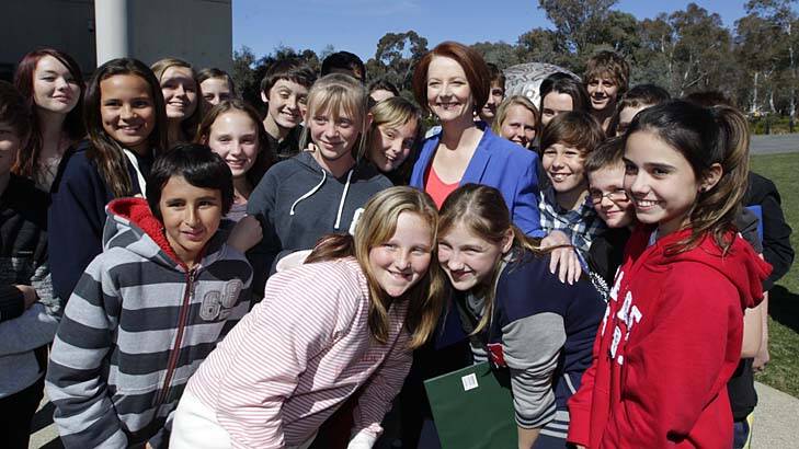 Aiming to be in the top five countries in the world by 2025 … Julia Gillard meets school students before addressing the National Press Club.