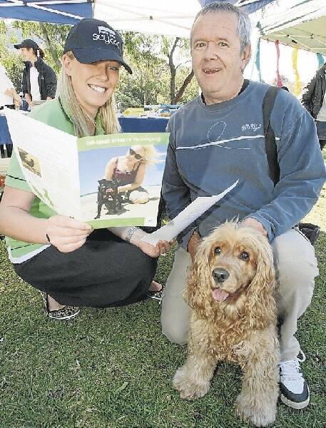 Amy Bell of Wollongong City Council and Goran Desnica with his dog Diva. Picture: ROBERT PEET