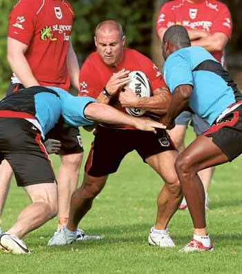 Dragons centre Matt Cooper in action during training at UOW Sports Oval yesterday. The club continues its bid for a feeder organisation. Picture: KEN ROBERTSON