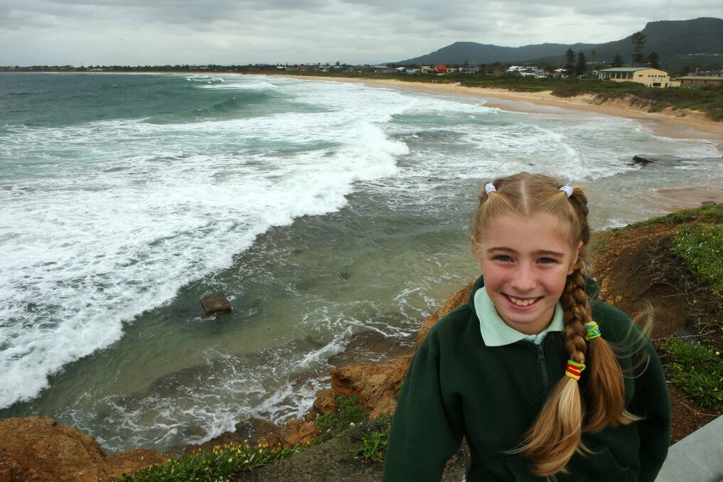 Molly Wildsoet, 9, didn't panic when she became caught in a sudden rip on Woonona Beach. Picture: KIRK GILMOUR