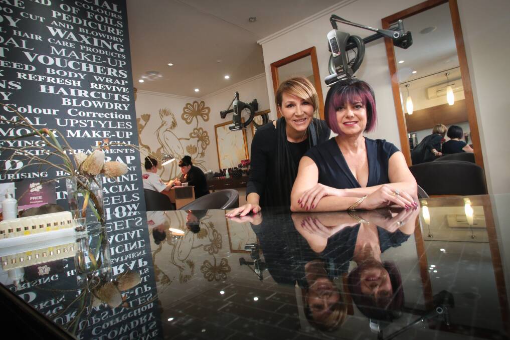 Nieves Murray, with Total Bliss salon owner Roza Rojano, after her hairdo. Picture: ADAM McLEAN