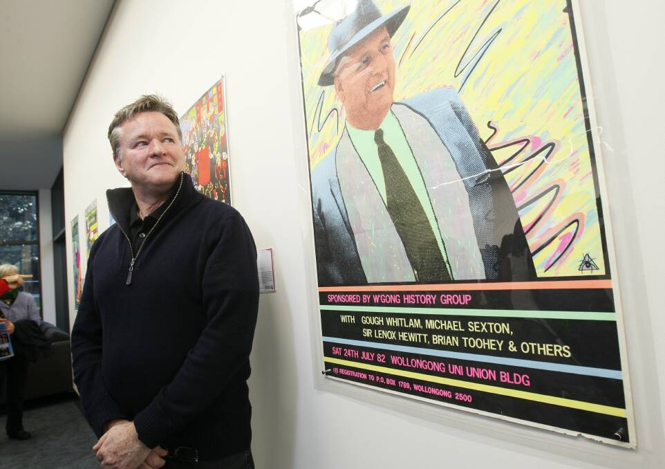 Gregor Cullen with one of the posters in the exhibition at UOW library. Picture: DAVE TEASE