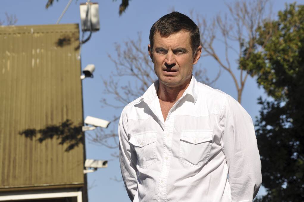 Adam Bonner in front of surveillance CCTV cameras in the Nowra Central Business district. Photo: South Coast Register