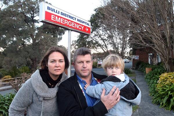Cindy and Jeremy Wallis with their two-and-a-half-year-old son, Brae, outside the entrance to Bulli Hospital. They want the emergency ward to remain open to service the northern suburbs of Wollongong. Picture: KIRK GILMOUR