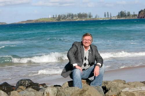 Neil Reilly, the new ALP candidate for Gilmore, takes a break on the rocks near the Bombo headland, north of Kiama, yesterday. He says he can topple Joanna Gash.   DAVE TEASE