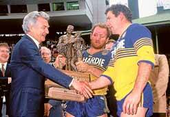 Peter Cronin has a lot to live up to if he's to better his dad Mick, pictured shaking hands with then Prime Minister Bob Hawke after Parramatta's win in the 1986 NSWRL grand final.