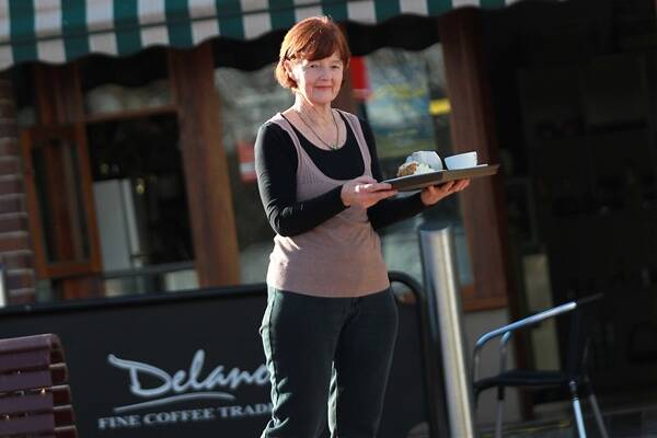Suzanne Hankey, owner of the Educated Palate in Civic Plaza, hopes the council revises regulations to allow more alfresco dining in the CBD. Picture: ORLANDO CHIODO