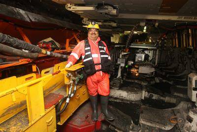 Arun Jagatramka with longwall mining equipment at the NRE site at Russell Vale. Photo: ROBERT PEET