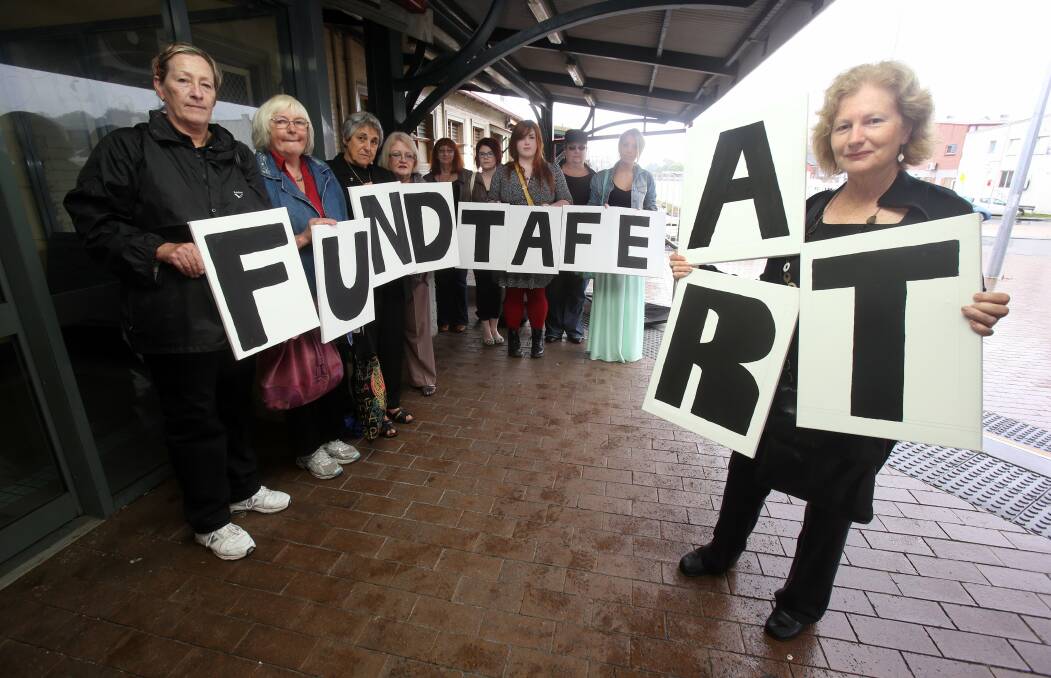 TAFE Illawarra arts students, including Save TAFE Illawarra chairwoman Ann Clarke on the way to the rally. Picture: ROBERT PEET