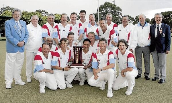 The Illawarra team and Zone 16 officials celebrate Sunday's success at Birrong. A narrow win over Zone 13 in the final handed Illawarra the Inter-Zone Championship for the first time since 1997.