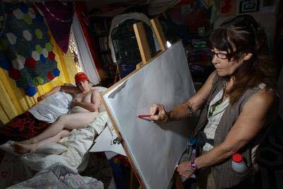 Kate Morris, posing for Jenny Millward, claims budget cuts have led to the virtual demise of life drawing classes. Picture: KEN ROBERTSON