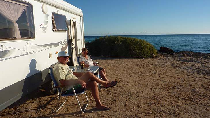"Life's one big holiday for us now that we're retired": John and Elaine Tickner spend months at a time travelling Australia in their caravan. Photo: Toby Hagon