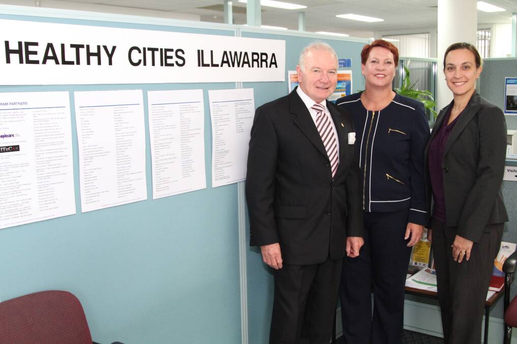 Wollongong Lord Mayor Gordon Bradbery, Maree Kerr and Laura Ruiz at Healthy City Illawarra's new office on the Princes Highway, Fairy Meadow.Picture: GREG ELLIS