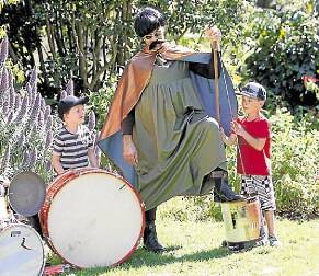 MERCURY NEWS GARDENSWollongong Botanic Gardens hosts some school holiday fun with dress up educational band The Beetles who perform classic songs and teach kids about plants and wildlife. Noah Roseverne 5 of West Wollongong beats the drum while his friend gets some tips from George the BeetleTuesday 24 September 2013Pic by Andy Zakeli