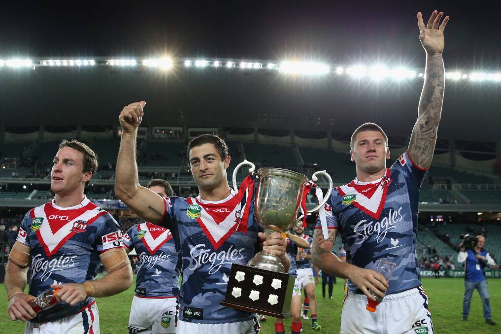 Roosters duo Anthony Minichiello (left) and Shaun Kenny-Dowall celebrate. Picture: GETTY IMAGES