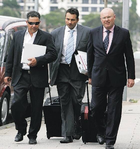Frank Vellar (left) arrives at Wollongong Courthouse with his legal team. Picture: KIRK GILMOUR
