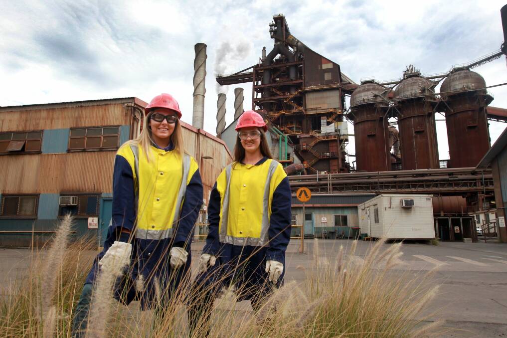 School students Tori Costello (left) and Claire Canham at BlueScope Steel's Port Kembla Steelworks. Picture: ORLANDO CHIODO