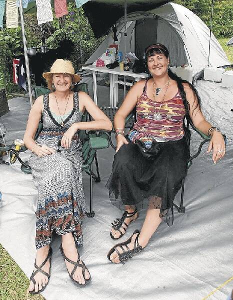 Mary Stratton (left) and Leneve Kelly from Woonona set up camp for this weekend's folk festival. Pictures: GREG TOTMAN