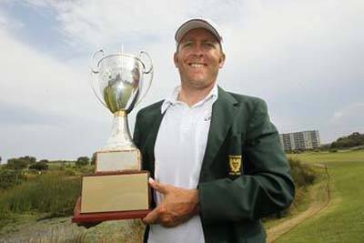 Matthew Guyatt holds the NSW PGA trophy after a dramatic comeback at Wollongong Golf Club yesterday. Picture: DAVE TEASE