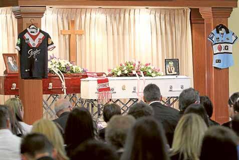 Coffins of Karen McGovern and Fernando Marino lay side by side in the chapel yesterday. Picture: ANDY ZAKELI