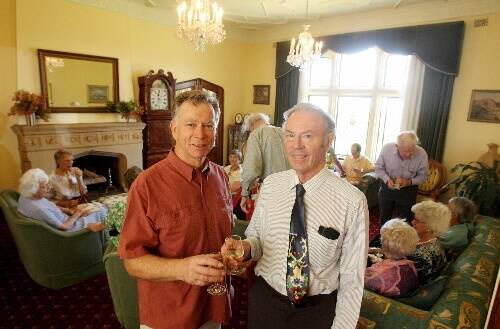 Friends of Wollongong Botanic Garden, Barry Baird (left) and David Murray, at their group's 28th consecutive Christmas lunch at Gleniffer Brae yesterday. The building will close to the public in May. Picture:  ROBERT PEET