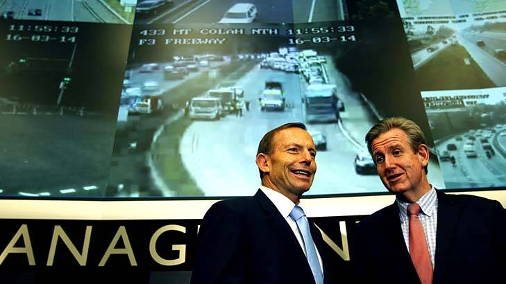 Well-connected travellers: Tony Abbott and Barry O'Farrell at the announcement. Photo: Steven Siewert