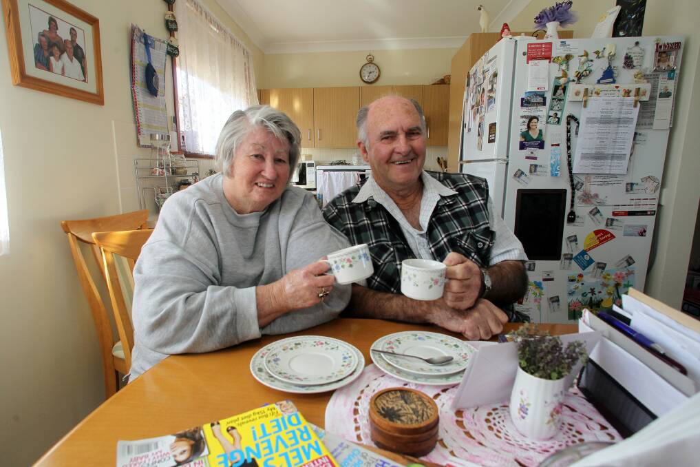 Ray and Mary Watkins of Lake Illawarra Warrigal Care have simple, effective ways of staying warm in winter. Picture: GREG TOTMAN