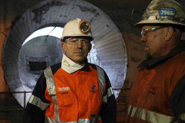 Tony Abbott, underground at the Helensburgh mine, warned of a carbon tax's impact. Picture: MELANIE RUSSELL