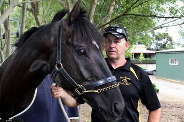 Unusual Suspect with handler Alan Keenan in Melbourne. He heads to Dubai tomorrow. Picture: GARY SISSONS