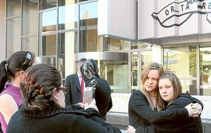 Melissa Ashfield (right) and cousin Charmaine at Angelic Karstrom's Parramatta parole hearing yesterday.