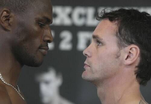 Daniel Geale (right) goes eye-to-eye at yesterday’s weigh-in with Kariz Kariuki - challenger for his IBF Pan Pacific middleweight crown. Picture: ROBERT PEET
