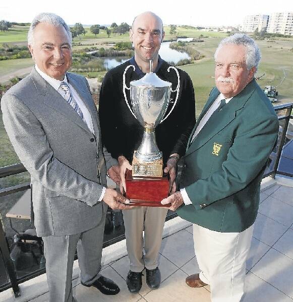 Australian PGA chairman Geoff Scott (left), professional Neil Speirs and Wollongong club captain Neil Masters with the NSW PGA trophy yesterday. Picture: ROBERT PEET