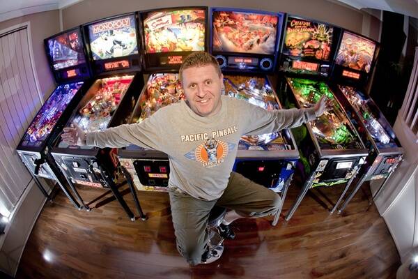 Horsley father Mark Watson has six pinball machines at home ready for the 15-member league he plans to start next month. Picture: DAVE TEASE