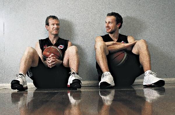 Hawks stalwarts Glen Saville (left) and Mat Campbell reminisce on their many shared moments as they prepare for the team's last home game. Picture: KIRK GILMOUR