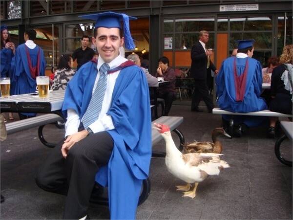 The duck sidles up to an unsuspecting uni graduate.