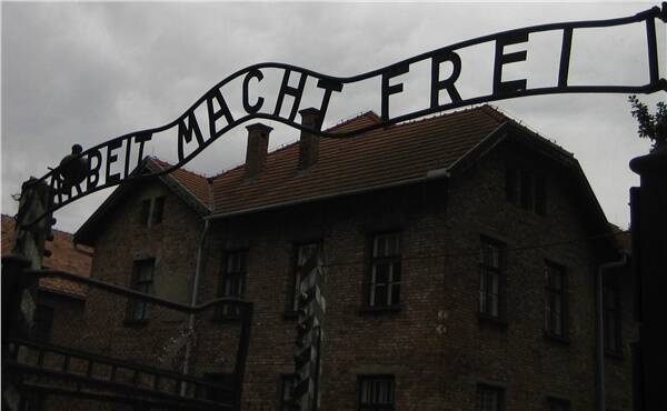 The sign over the entrance to the camp Arbeit Mach Frei - work makes you free.
