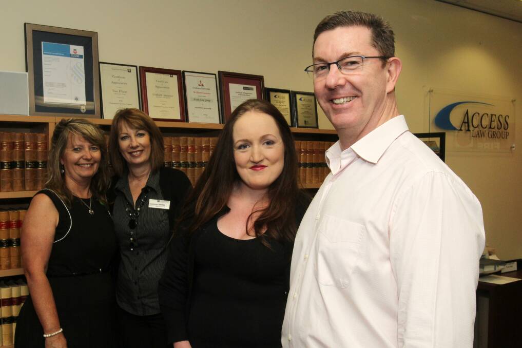 Liz Anderson, Leanne Smith and Graham Lancaster surprised Hayleigh Gray, second from right, with a makeover. Picture: GREG TOTMAN