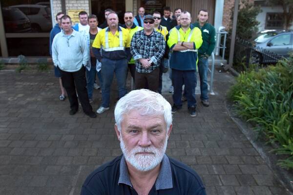 AWU Port Kembla branch secretary Wayne Phillips (front) with other union delegates who have been in negotiations with BlueScope.  ORLANDO CHIODO