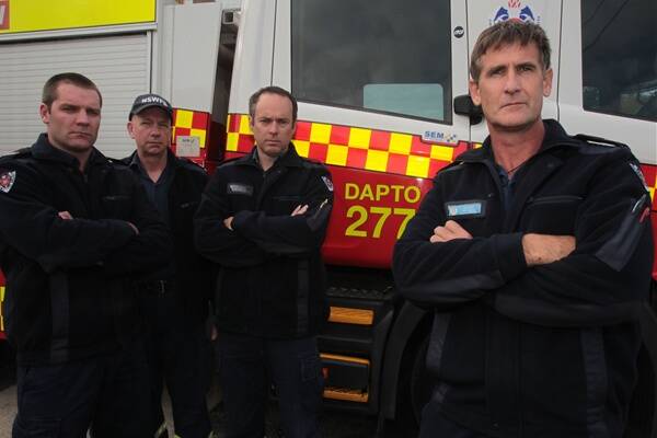 Dapto firies (from left) Mark Lewis, Greg Shepherd, Andrew Phillips and Ron Baard fear for the threat to public safety if the station had to close temporarily. Picture: GREG TOTMAN