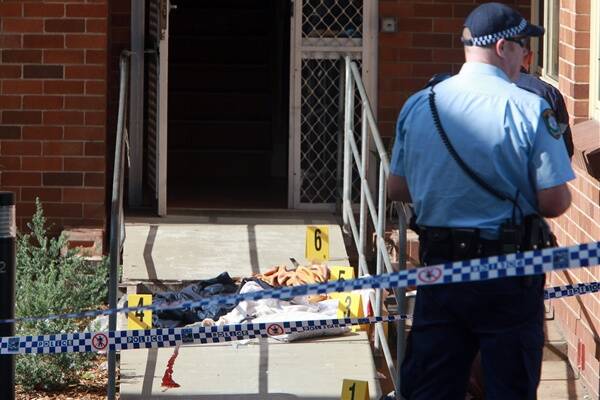 The scene at Warrawong this morning after a man fell from the third floor of a Todd St building