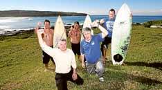 Win: Union secretary Arthur Rorris, SKA's Mark Whalan and surfers celebrate at Killalea. Picture: GREG TOTMAN