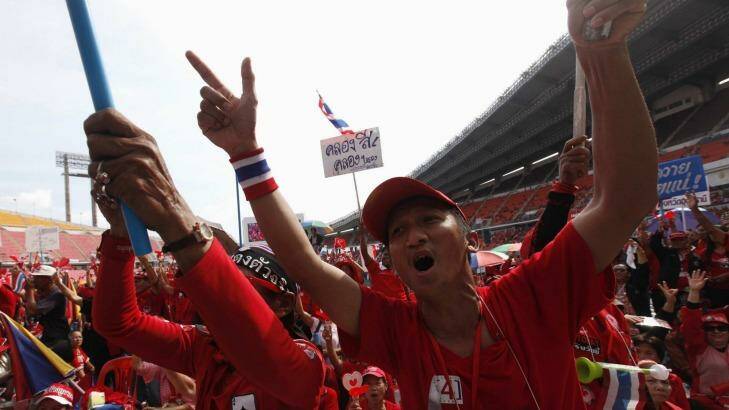 Preparing to take to the streets again ... Pro-government "red shirt" supporters react during a rally in November.