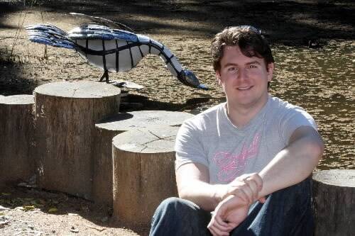 Blake Cochran, who set up a Facebook group dedicated to the duck, with a sculpture of the fiend.