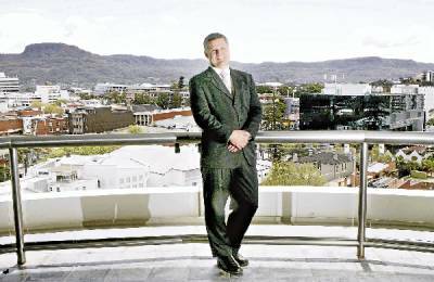 General manager David Farmer wants Wollongong City Council back in the black by 2012.