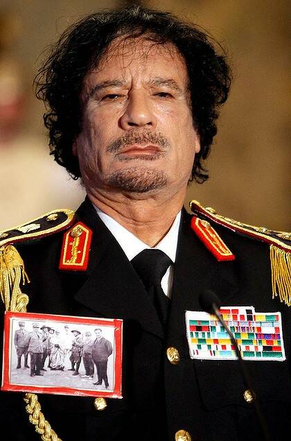Muammar Gaddafi ... "They love me, all my people."